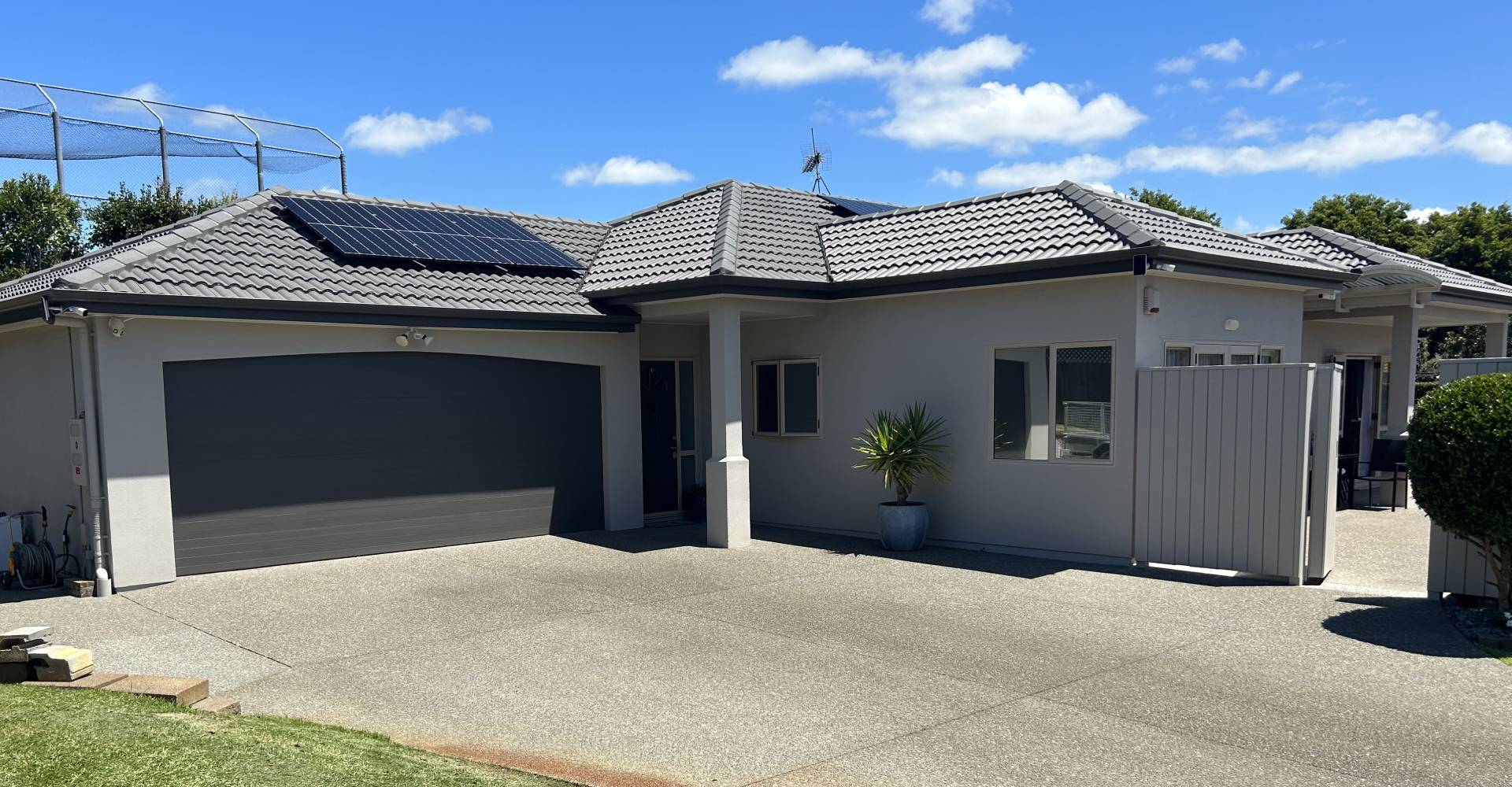 The exterior of a house now clean after soft washing.
