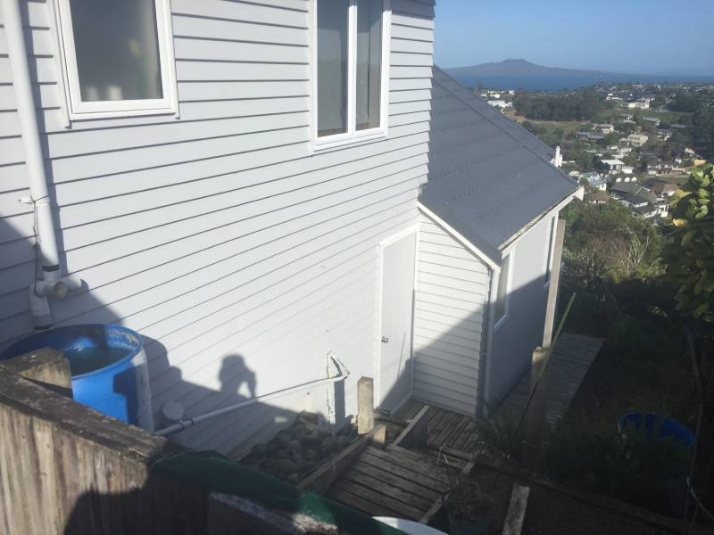 Exterior wall of a house before it gets cleaned.